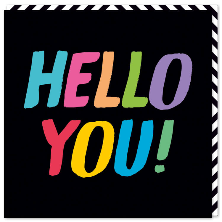 A jet black card with the words ‘Hello you!’ in capitalised pastel rainbow font