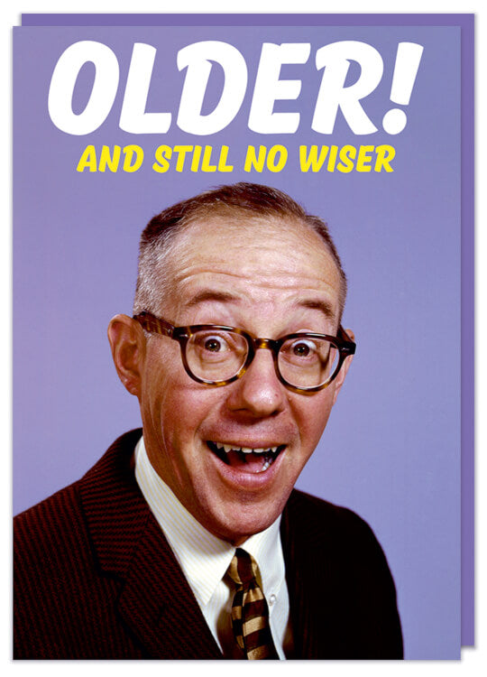 A funny greeting card with a picture of a smiling man in glasses