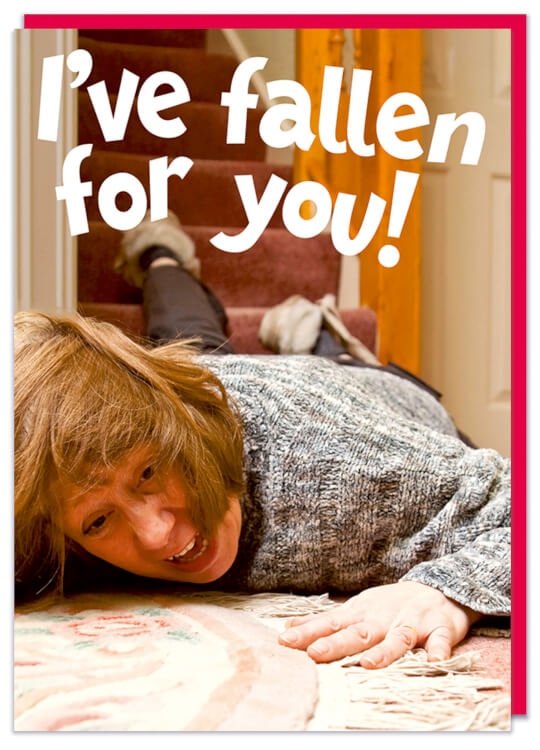 A Valentine's Day card with a dramatic posed photo of an old lady fallen down some stairs.  Funky text above the image reads I've fallen for you