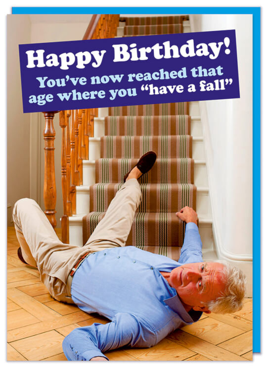 A birthday card with a picture of an elderly gentleman lying at the foot of a set of stairs