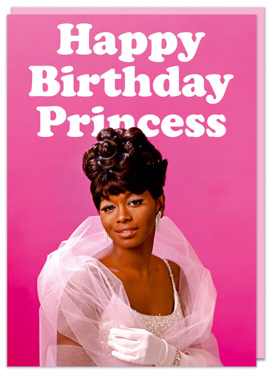 A funny birthday card featuring a 1960s picture of a glamorous African American young woman in a glittery ballgown against a pink background