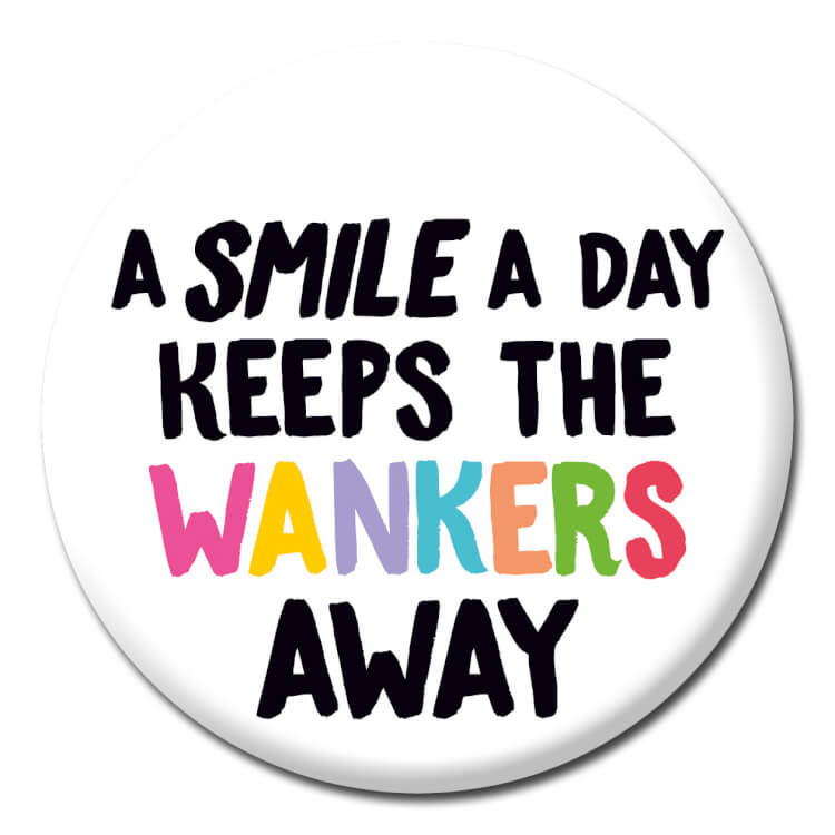 A white badge reading A smile a day keeps the wankers away