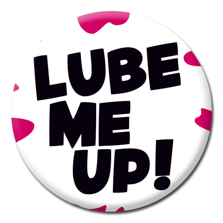 This badge features a white splat on a red background.  Simple black text on top reads Lube me up!