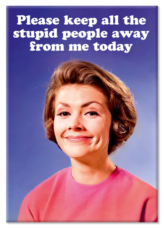 A fridge magnet with a 1960s picture of a smiling sarcastic looking woman looking to camera against a blue background