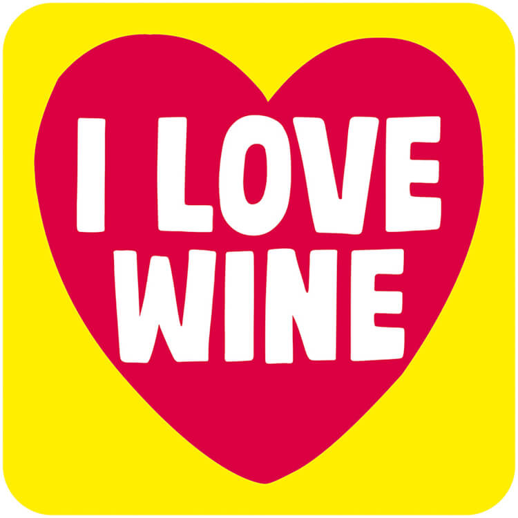 A sunny yellow coaster with a big pink heart in the middle and the words I love wine in capitalised, white font