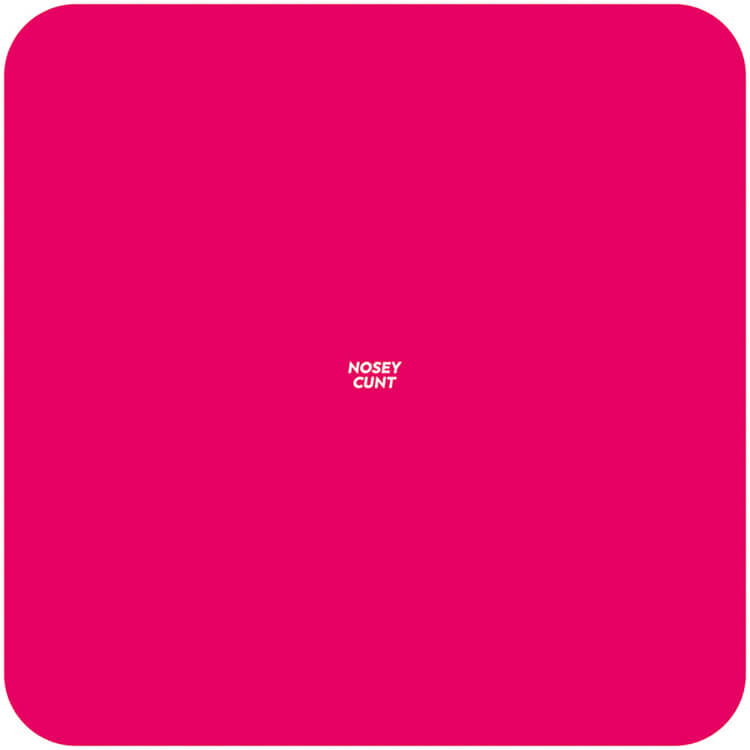 A deep pink coaster with very small capital letters in the middle reading nosey cunt