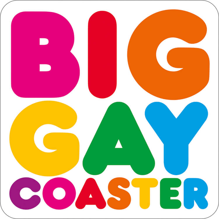 A bright white coaster, with the words ‘Big gay coaster’ in curved, capitalised rainbow font