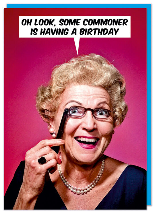A birthday card with a 1960's picture of a wealthy looking woman holding up theatre glasses and looking at camera smiling
