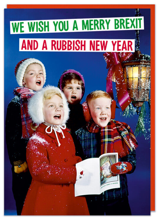 A Christmas card with a retro picture of a group of young carol singers