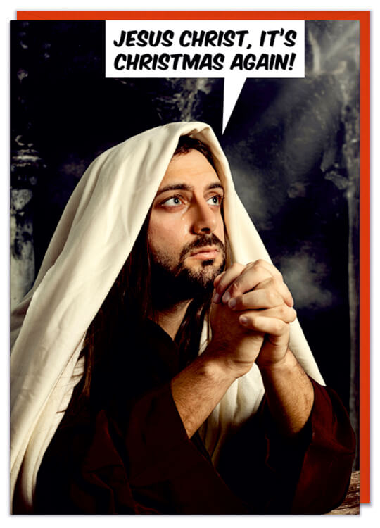 A Christmas card with a staged photo of Jesus looking intense with his hands clasped