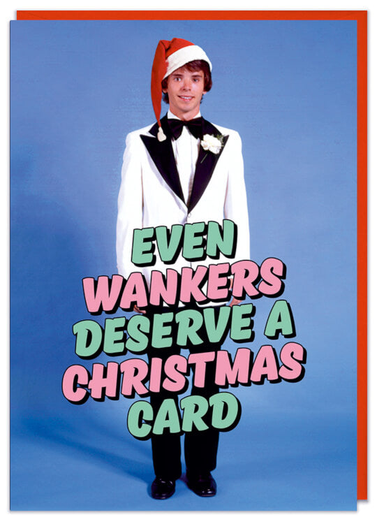 A Christmas card with a picture of a teenager dressed in a white 1970s prom tuxedo