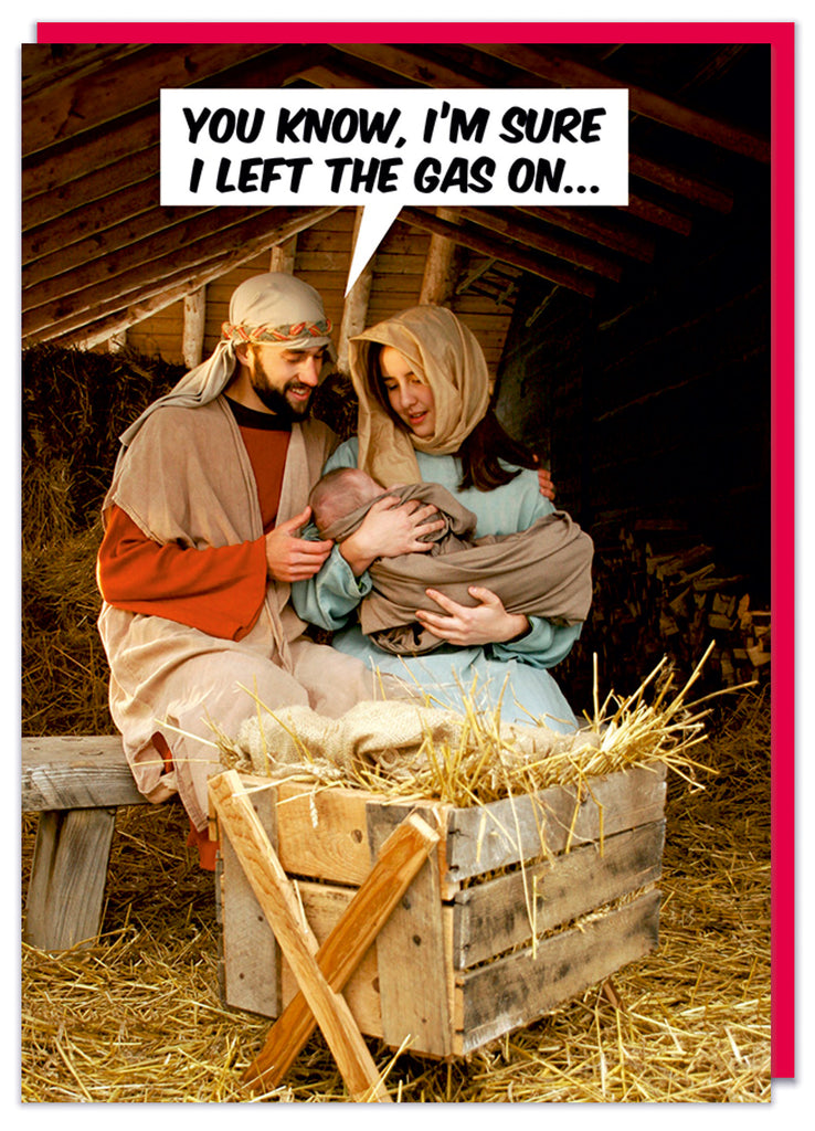 A Christmas card with a photograph of Mary and Joseph cradling baby Jesus in the stable.  Joseph says You know, I'm sure I left the gas on...