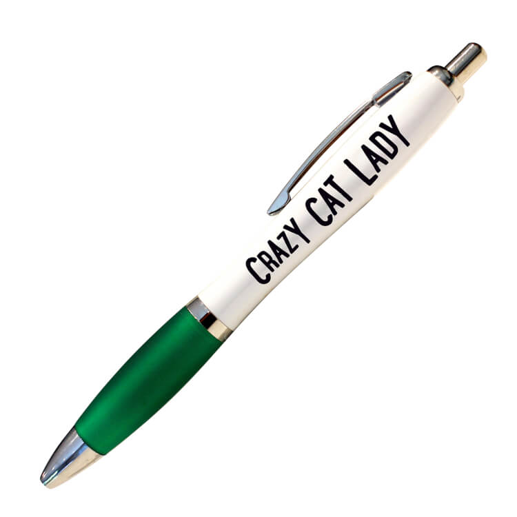 A white ballpoint pen with a green grip and black ink.  Black text on one side reads Crazy cat lady