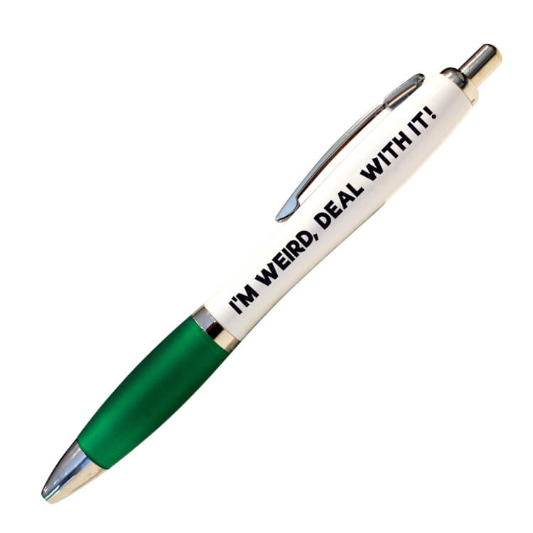A white ballpoint pen with a green grip and black ink. Black text on one side reads I'm weird, deal with it!