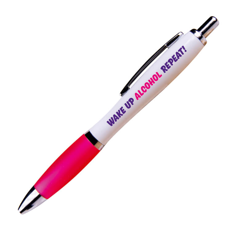 A white ballpoint pen with a pink grip and black ink. Slanted purple and pink text reads Wake up Alcohol Repeat