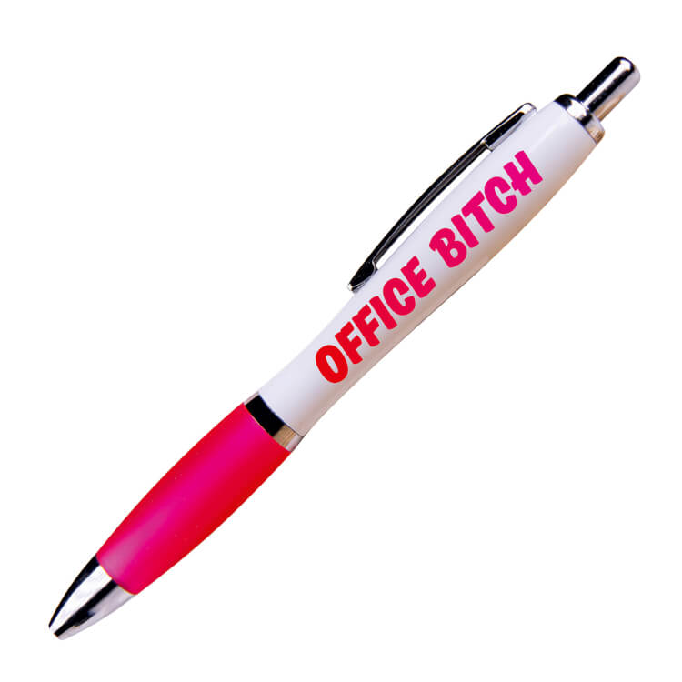 A white ballpoint pen with a pink grip and black ink. Red text on one side reads Office bitch