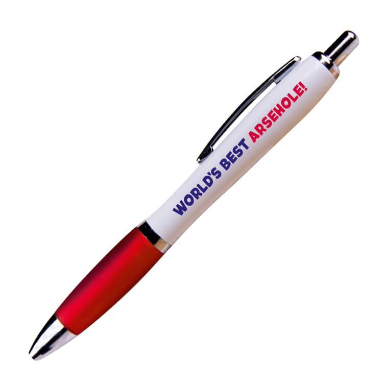 A white ballpoint pen with a red grip and black ink. Capitalised red and deep blue text along one side reads World's best arsehole