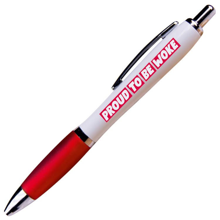 A white ballpoint pen with a red grip and black ink. White text in a red box reads Proud to be Woke