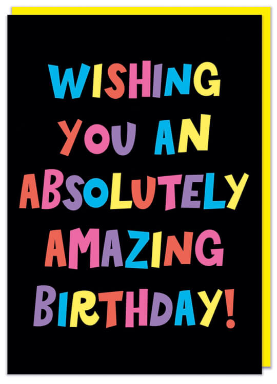 A black birthday card featuring bold angular multicoloured rainbow letter that read Wishing you an absolutely amazing birthday