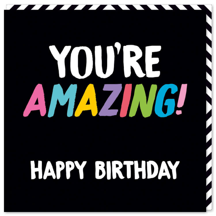 A jet black card with the words ‘You’re amazing! Happy birthday’ in capitalised white font. The word ‘Amazing’ is in capitalised, pastel rainbow font