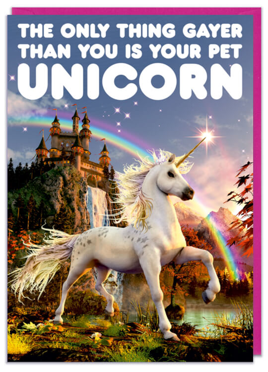A greeting card with a photo of a unicorn in front of a magical castle