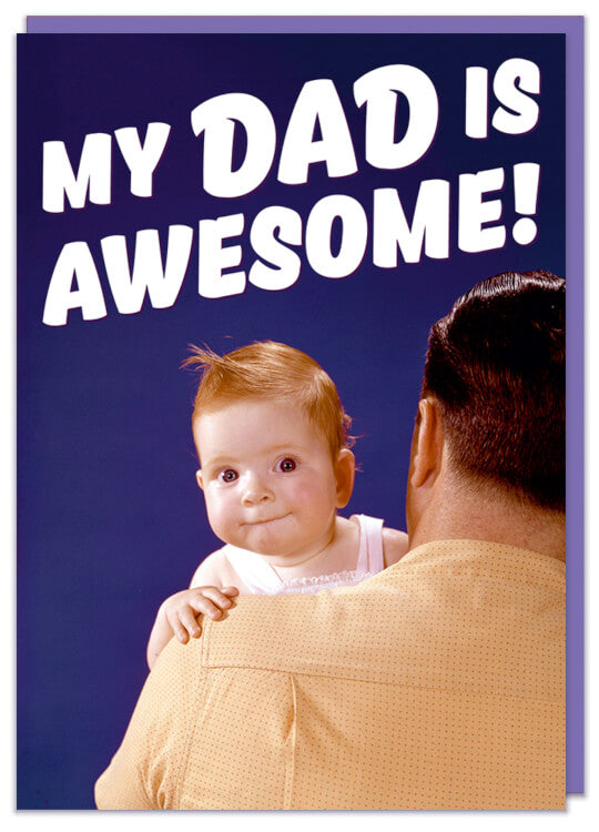 A Fathers Day card with a picture of  dad holding a baby