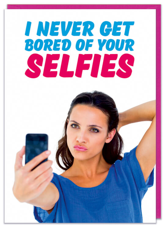 A greeting card with a picture of a pouting woman with dark hair taking a selfie on her mobile phone