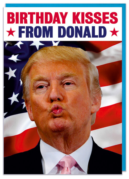 A greeting card with a picture of Trump and reads Birthday Kisses from Donald