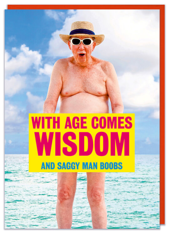 A birthday card with a picture of a naked old man on a beach holding a big yellow sign