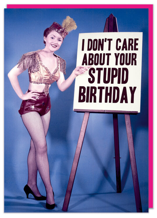 A birthday card with a picture of a woman in showgirl costume standing next to an easel