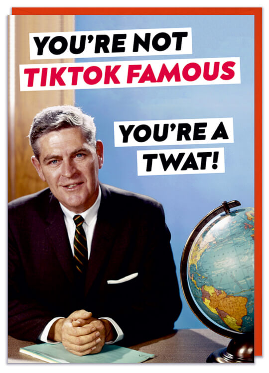 A greeting card with a 1970s picture of an authoritative man sitting at a desk
