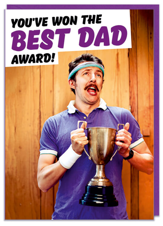 A Fathers Day card with a funny picture of a man holding a trophy