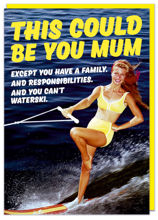 A birthday card with a photo of a smiling woman looking at the camera waterskiing