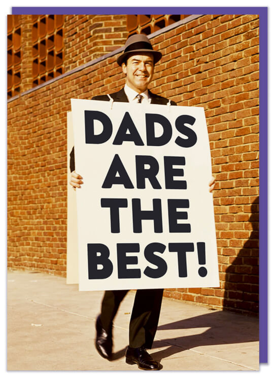 A greeting Card with a retro photo of a smiling man in a suit walking down a street with a large sandwich board that reads Dads are the best!
