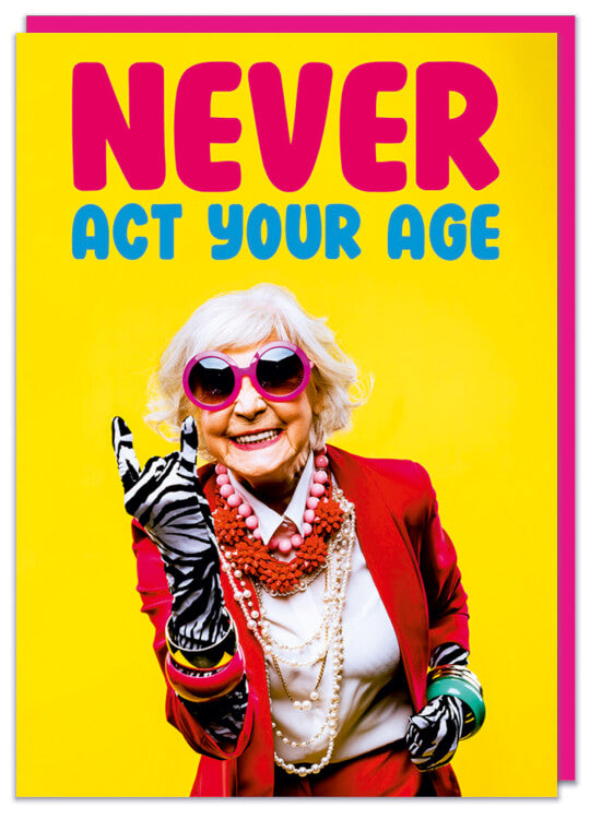 A bright yellow birthday card featuring a trendy elderly lady in a bright red jacket and big sunglasses