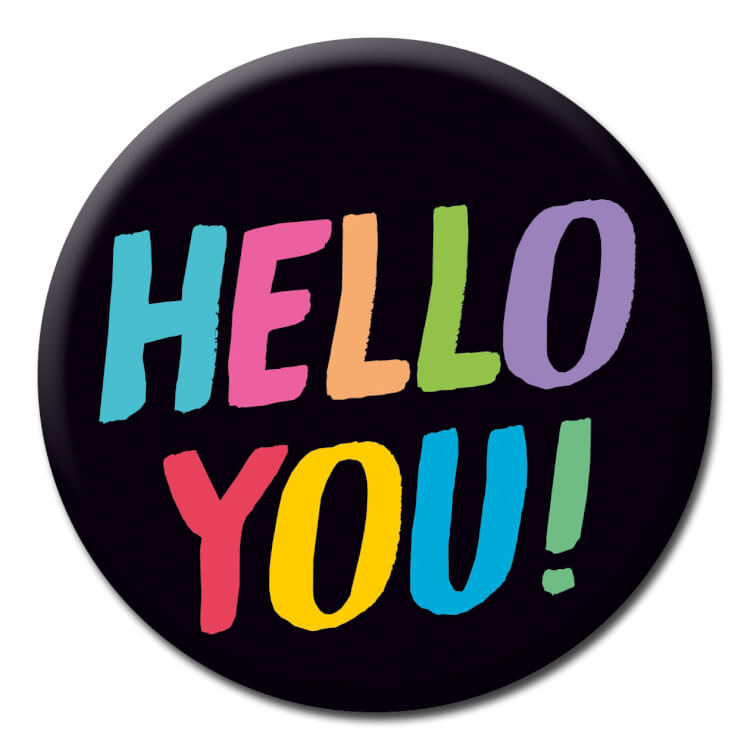 A black badge with multicolour text reading Hello You!