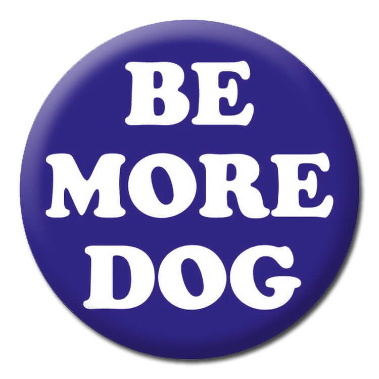 A dark blue badge with rounded white text that reads Be more dog