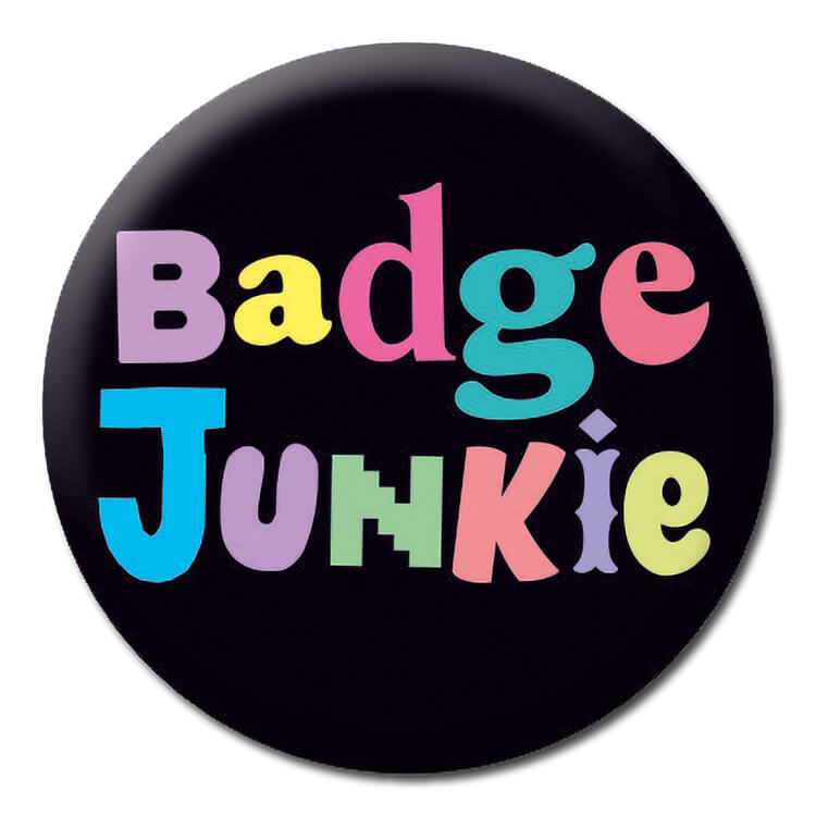 A dark blue badge with different pastel multicoloured fonts that spell out Badge junkie
