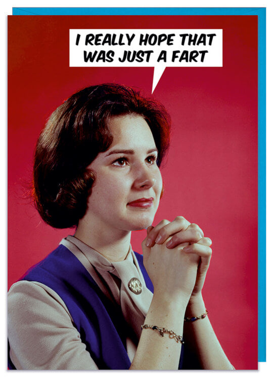 A red birthday card with a 1960s photo of a young woman praying in a blue blouse