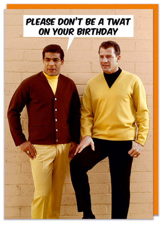 A birthday card featuring a 1960's picture of two men in yellow and brown sweaters looking into the distance