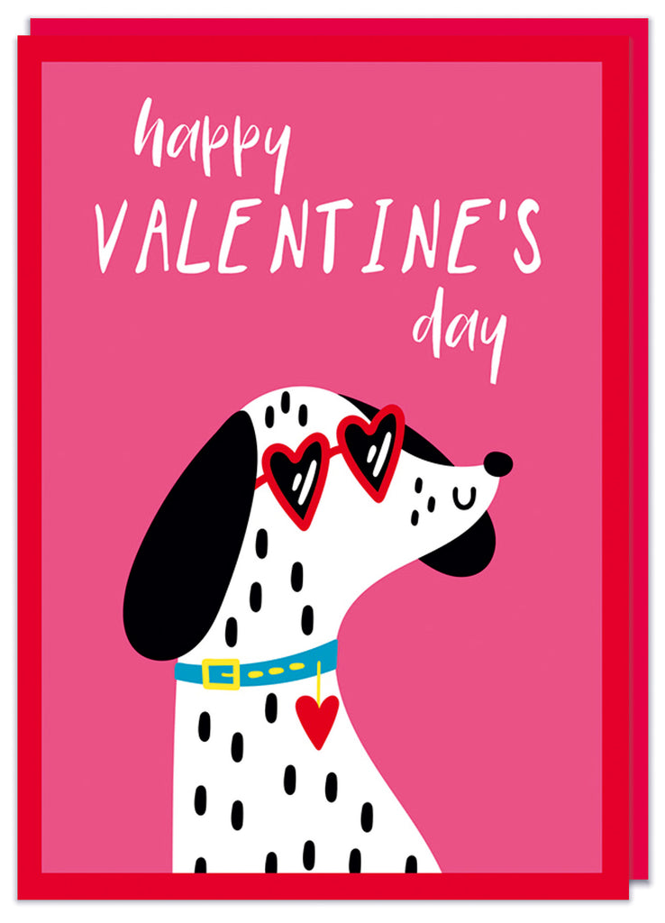 A cute Valentine's card with a deep red border and inside is an illustration of a cute dalmatian dog wearing heart shaped shades.  Simple text above reads Happy valentine's day