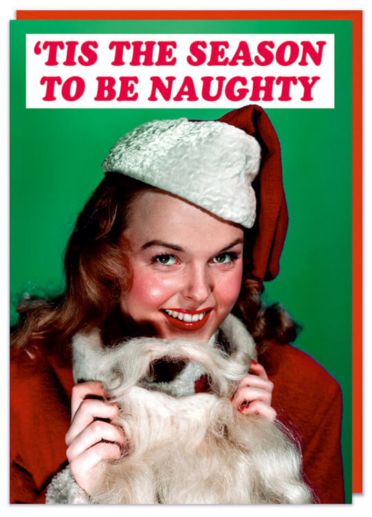 A Christmas card with a 1950s picture of a young woman dressed up with a beard as Santa Claus