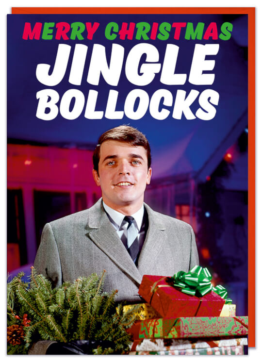 A Christmas card with a 1960s picture of a smiling man holding a mini Christmas tree and presents