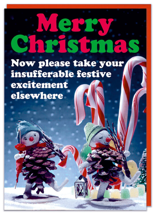 A Christmas card with a retro picture of two snowmen models walking against a backdrop of snow and candy canes