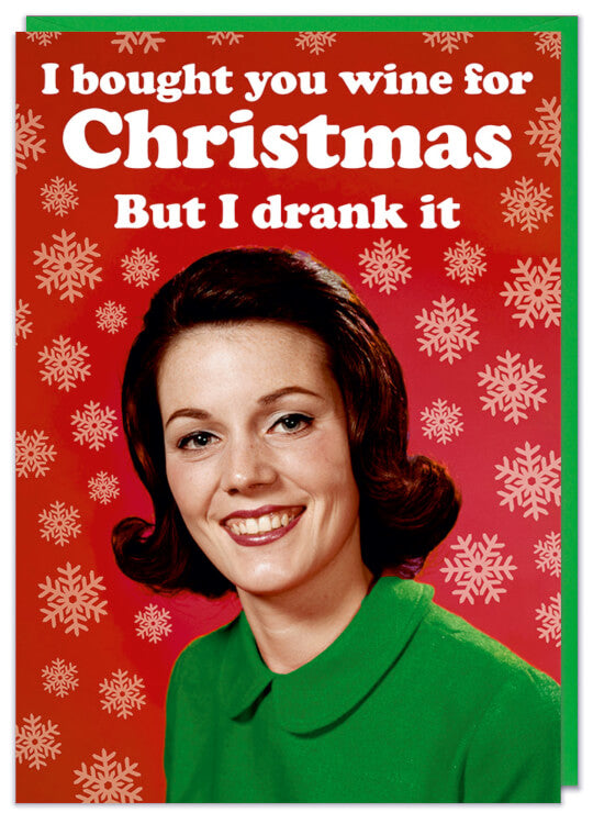 A Christmas card featuring a retro picture of a smiling young woman in a green top looking to camera.  White text above her reads I bought you wine for Christmas but I drank it