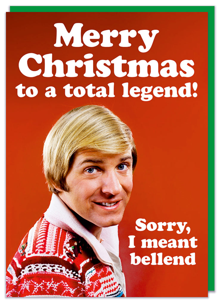 A funny Christmas card featuring a 1960s picture of a smiling man in a festive jumper surrounded by white text that reads Merry Christmas to a total legend, sorry I meant bellend