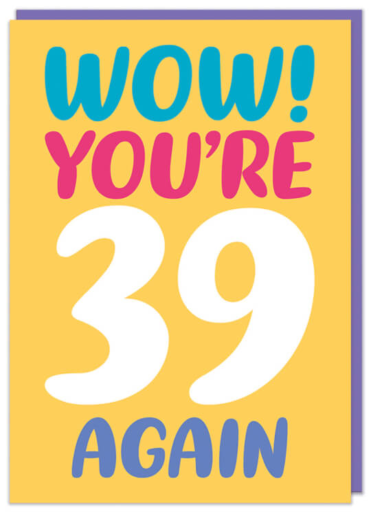 A bright yellow birthday card with blue, red, purple and white rounded letters that read Wow! You're 39 again