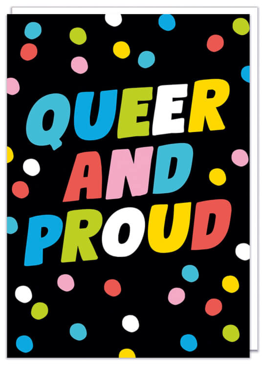 A black birthday card with bold text in the middle in shades of blue, pink, yellow and white that read Queer and proud and surrounded by complimentary dots of the same colours