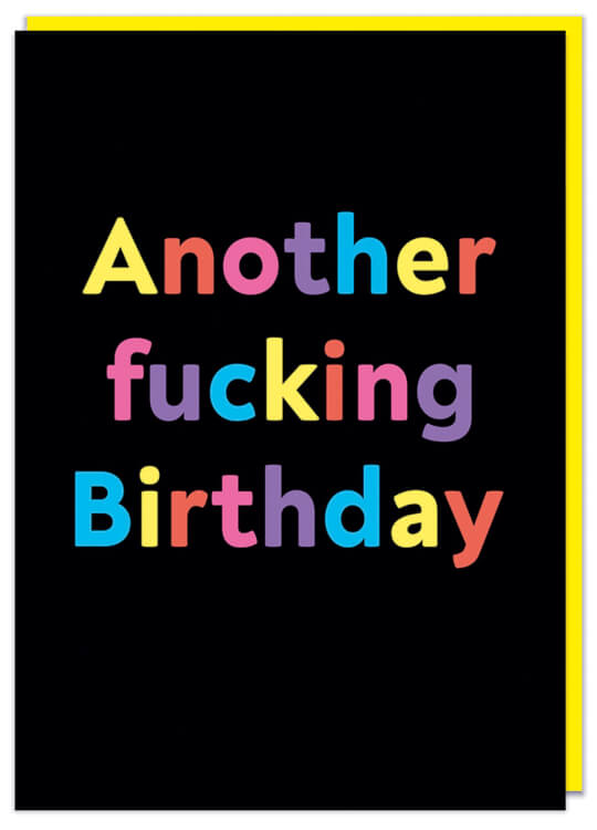 A black birthday card featuring pastel multicoloured text that reads Another fucking birthday
