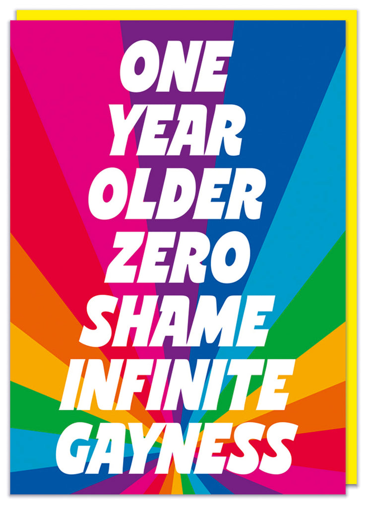 A funny LGBTQ+ birthday card with a bold rainbow starburst pattern overlaid with white dramatic text that reads One year older zero shame infinite gayness